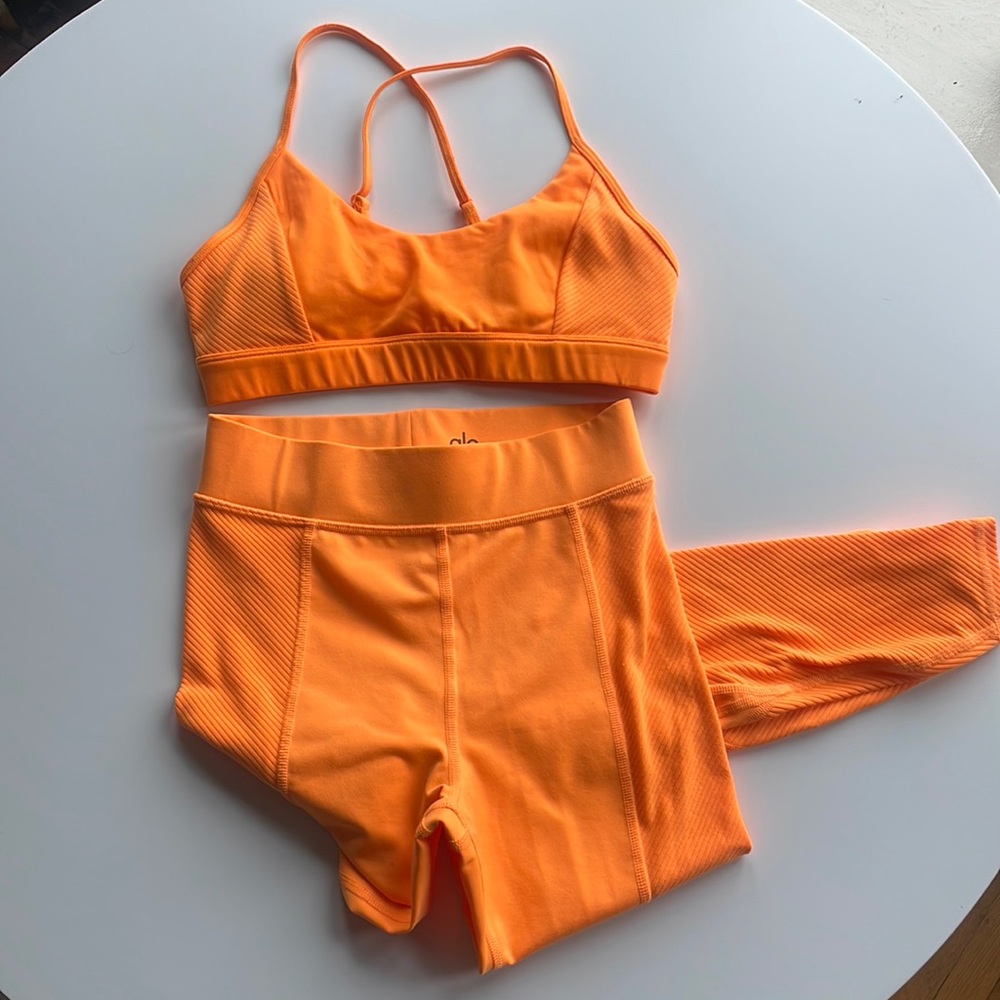 ALO Yoga - sold as set size small top, XS leggings. CA poppy or marigold color